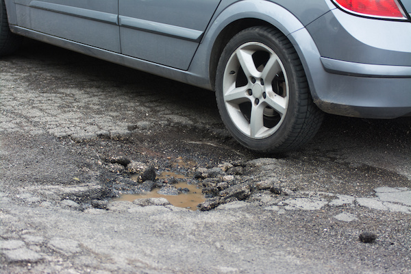 What to Know About Potholes and Wheel Alignments